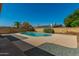 Relaxing kidney-shaped pool surrounded by gravel at 6034 E Hillview St, Mesa, AZ 85205