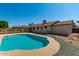 Inviting kidney-shaped pool in the backyard at 6034 E Hillview St, Mesa, AZ 85205
