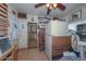 Functional pantry with extra refrigerator and storage at 3002 W Latham St, Phoenix, AZ 85009
