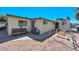 Backyard with patio, bench, and swing set at 3002 W Latham St, Phoenix, AZ 85009