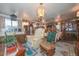 Elegant dining room with a wooden table and chandelier at 3002 W Latham St, Phoenix, AZ 85009