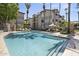 Refreshing community pool with ample lounge chairs at 2025 E Campbell Ave # 260, Phoenix, AZ 85016