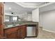 Kitchen with dishwasher and granite counters at 2025 E Campbell Ave # 260, Phoenix, AZ 85016
