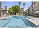 Inviting community pool with lounge chairs for relaxation at 2025 E Campbell Ave # 260, Phoenix, AZ 85016