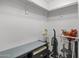 Walk-in closet with shelving and ample storage space at 2025 E Campbell Ave # 260, Phoenix, AZ 85016
