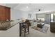 Bright living room with comfy sofa and access to a balcony at 2025 E Campbell Ave # 260, Phoenix, AZ 85016