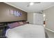 Spacious bedroom with king-size bed and access to the bathroom at 2025 E Campbell Ave # 260, Phoenix, AZ 85016