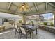 Covered patio with table and chairs great for outdoor dining at 2025 E Campbell Ave # 260, Phoenix, AZ 85016
