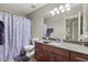 Clean bathroom with granite countertop, shower/tub combo, and updated vanity at 2025 E Campbell Ave # 260, Phoenix, AZ 85016