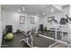 Well-equipped fitness center with various weight machines and free weights at 2025 E Campbell Ave # 260, Phoenix, AZ 85016