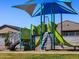 Modern playground equipment under a shaded play structure at 4198 W Jeanette Ln, San Tan Valley, AZ 85144