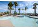 Relaxing community pool with palm trees and seating at 3649 E Hazeltine Way, Chandler, AZ 85249