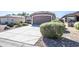 Front view of the house with a gravel driveway at 3649 E Hazeltine Way, Chandler, AZ 85249