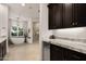 Bathroom with soaking tub, walk-in shower, and granite countertops at 2608 S Sycamore Village Dr, Gold Canyon, AZ 85118