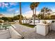 Outdoor kitchen and seating area overlooking a refreshing pool at 4633 N 49Th Pl, Phoenix, AZ 85018