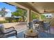 Covered patio perfect for outdoor dining and relaxation at 22303 N Montecito Ave, Sun City West, AZ 85375
