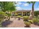 Landscaped backyard with patio and desert landscaping at 22303 N Montecito Ave, Sun City West, AZ 85375