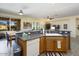 Large kitchen island with double sink and dishwasher at 22303 N Montecito Ave, Sun City West, AZ 85375