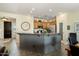 Modern kitchen with stainless steel appliances and island at 22303 N Montecito Ave, Sun City West, AZ 85375