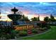Corts Bella entrance with fountain at sunset at 22303 N Montecito Ave, Sun City West, AZ 85375