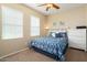 Guest bedroom with a full-size bed and ample closet space at 22303 N Montecito Ave, Sun City West, AZ 85375