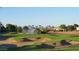 Golf course with sand traps and manicured greens at 22303 N Montecito Ave, Sun City West, AZ 85375