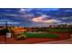 Golf course landscape with water feature at sunset at 22303 N Montecito Ave, Sun City West, AZ 85375