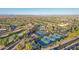 Community tennis courts near pool and clubhouse with mountain views at 22303 N Montecito Ave, Sun City West, AZ 85375