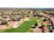 Aerial view of a golf course and surrounding homes at 22303 N Montecito Ave, Sun City West, AZ 85375