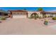 Single-story home with driveway and desert landscaping at 4622 E Flower Ave, Mesa, AZ 85206