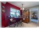 Bright kitchen nook with window seating and vintage wooden cabinet at 4622 E Flower Ave, Mesa, AZ 85206