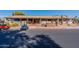 Community clubhouse with golf cart parking at 4622 E Flower Ave, Mesa, AZ 85206