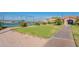 Landscaped area next to tennis courts and community building at 4622 E Flower Ave, Mesa, AZ 85206