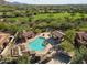 Community pool with multiple cabanas and mountain views at 7221 E Eclipse Dr, Scottsdale, AZ 85266