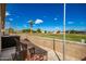 Patio with seating and view of golf course at 650 N Hawes Rd # 2827, Mesa, AZ 85207