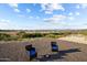 Relaxing backyard with fire pit and scenic mountain views at 1940 W Ringo Rd, Wickenburg, AZ 85390