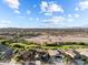 Aerial view of house and surrounding neighborhood at 1940 W Ringo Rd, Wickenburg, AZ 85390