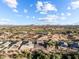 Aerial view showcasing the home, landscape, and distant mountains at 1940 W Ringo Rd, Wickenburg, AZ 85390