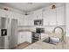 Modern kitchen with stainless steel appliances and ample counter space at 1940 W Ringo Rd, Wickenburg, AZ 85390