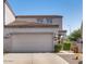 Two-story house with attached garage at 13083 N 87Th Dr, Peoria, AZ 85381