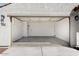 Attached garage with ample space for parking and storage at 15112 W Hadley St, Goodyear, AZ 85338