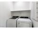 Convenient laundry room with washer and dryer included at 15112 W Hadley St, Goodyear, AZ 85338