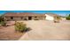 Ranch-style home with large driveway and desert landscaping at 1218 W Mountain View Dr, Mesa, AZ 85201