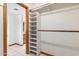 Large walk-in closet with shelving and hanging rod at 1218 W Mountain View Dr, Mesa, AZ 85201