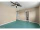 Bedroom with teal flooring and en-suite bathroom at 9615 N 34Th Ave, Phoenix, AZ 85051