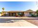 Single-story home with solar panels and landscaping at 9615 N 34Th Ave, Phoenix, AZ 85051