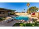 Inviting swimming pool with diving board at 9615 N 34Th Ave, Phoenix, AZ 85051