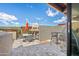 Private patio with outdoor seating, a table, and an umbrella at 6525 E Cave Creek Rd # 18, Cave Creek, AZ 85331