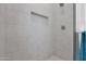 Modern shower with grey tile and built-in niche at 36366 W Whitton Ave, Tonopah, AZ 85354