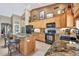 Modern kitchen with granite countertops and stainless steel appliances at 1946 E Everett Dr, Phoenix, AZ 85022